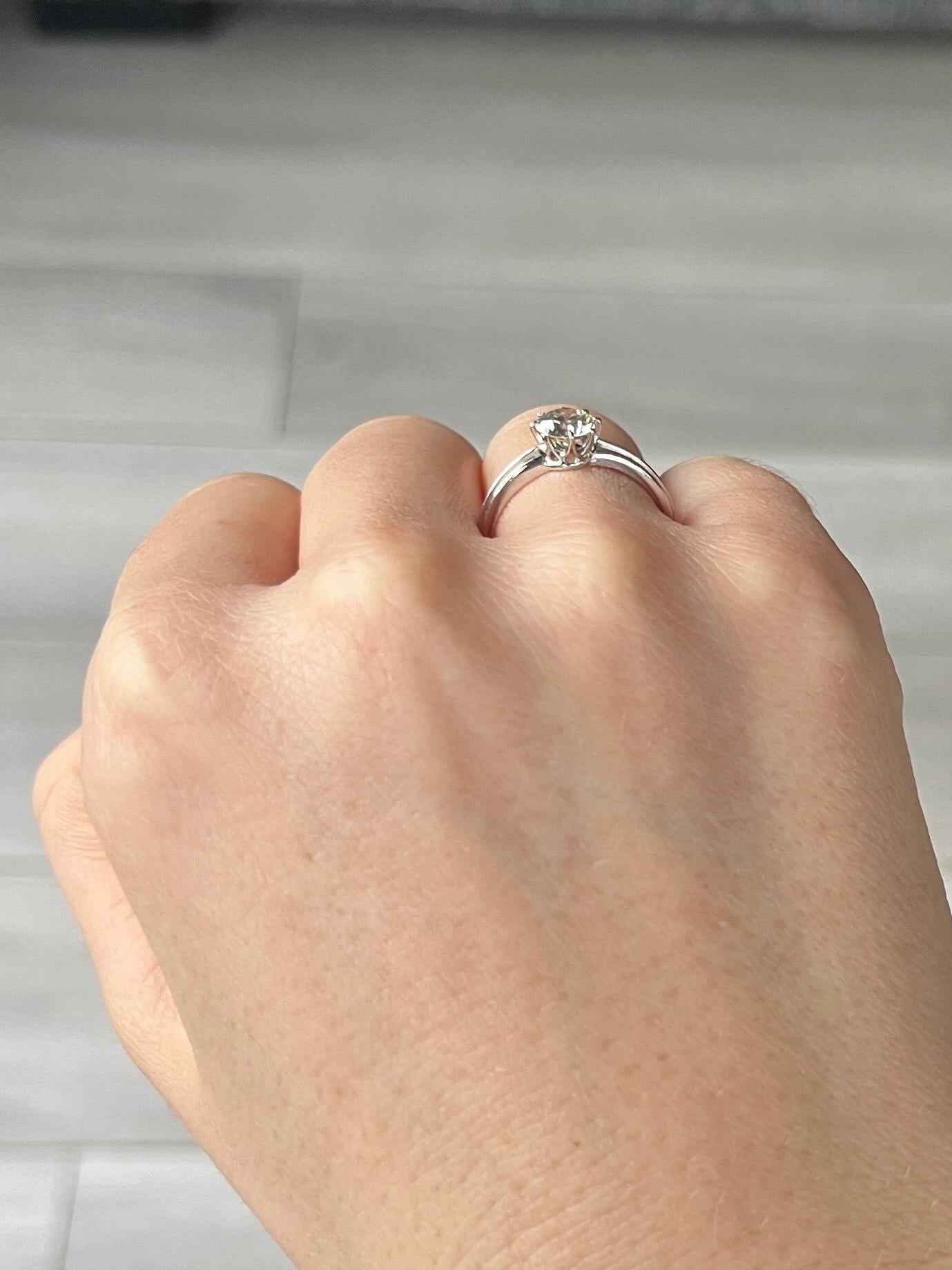 A vintage platinum old European cut diamond solitaire ring. The diamond measures 90 pts and is J colour VS2. The detailing on the shoulders of this ring is simple and classic.

Ring Size: N or 6 3/4
Height Off Finger: 5mm

weight: 2.5g
