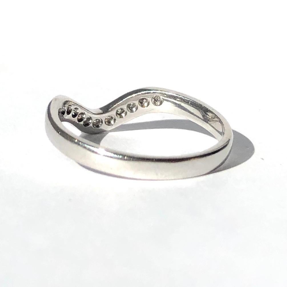 Modern Vintage Diamond and 18 Carat White Gold Waved Band For Sale