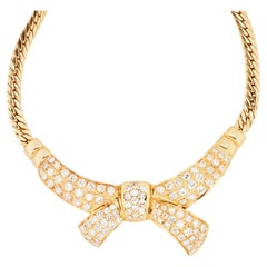 Collier vintage en or jaune 18 carats et diamants avec grand motif de noeud