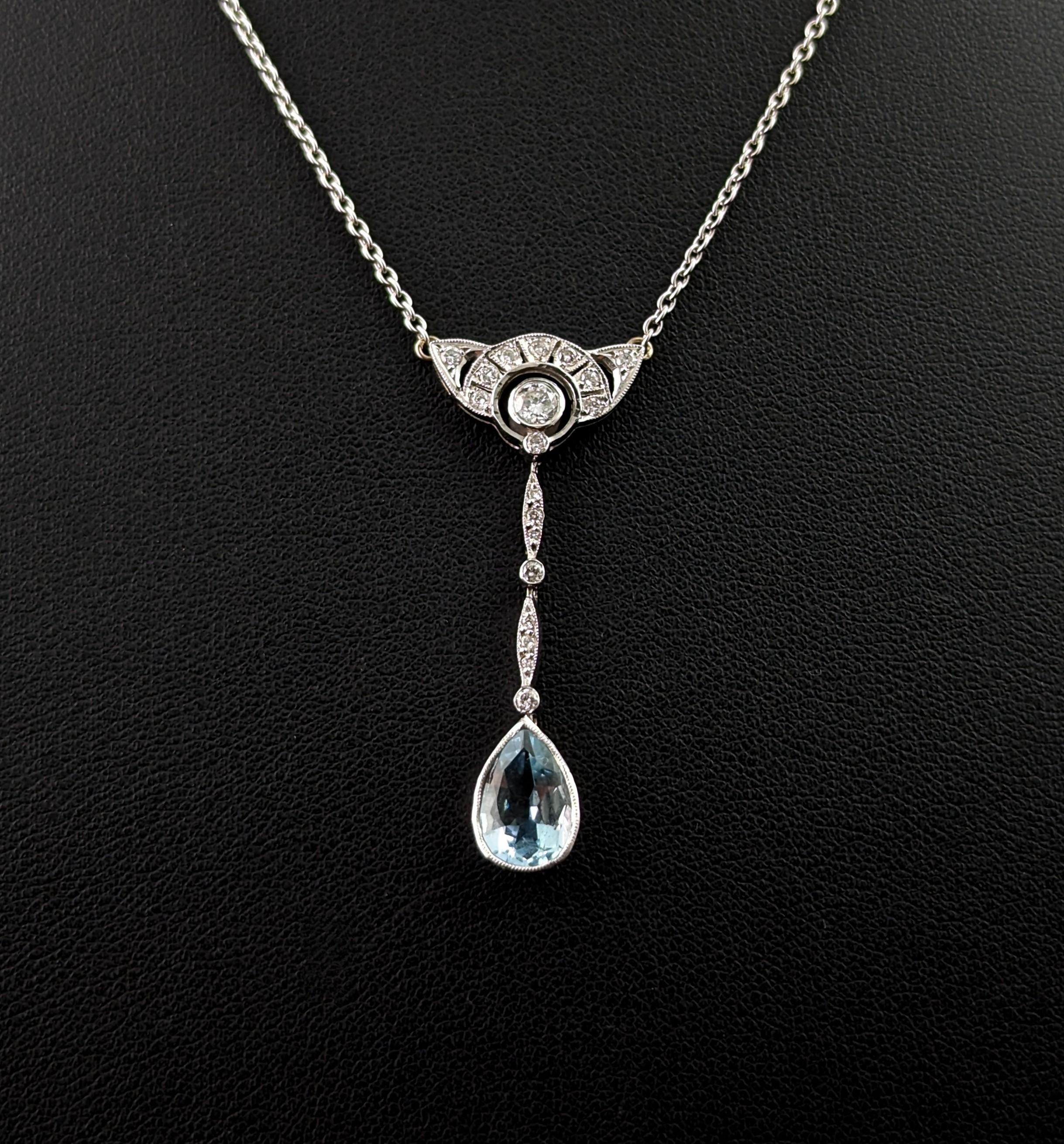 An absolutely stunning vintage Aquamarine and Diamond pendant necklace.

It has been designed in a delicate Art Deco style and oozes class and sophistication.

The necklace is crafted in cool bright platinum and features a y style drop pendant.

The