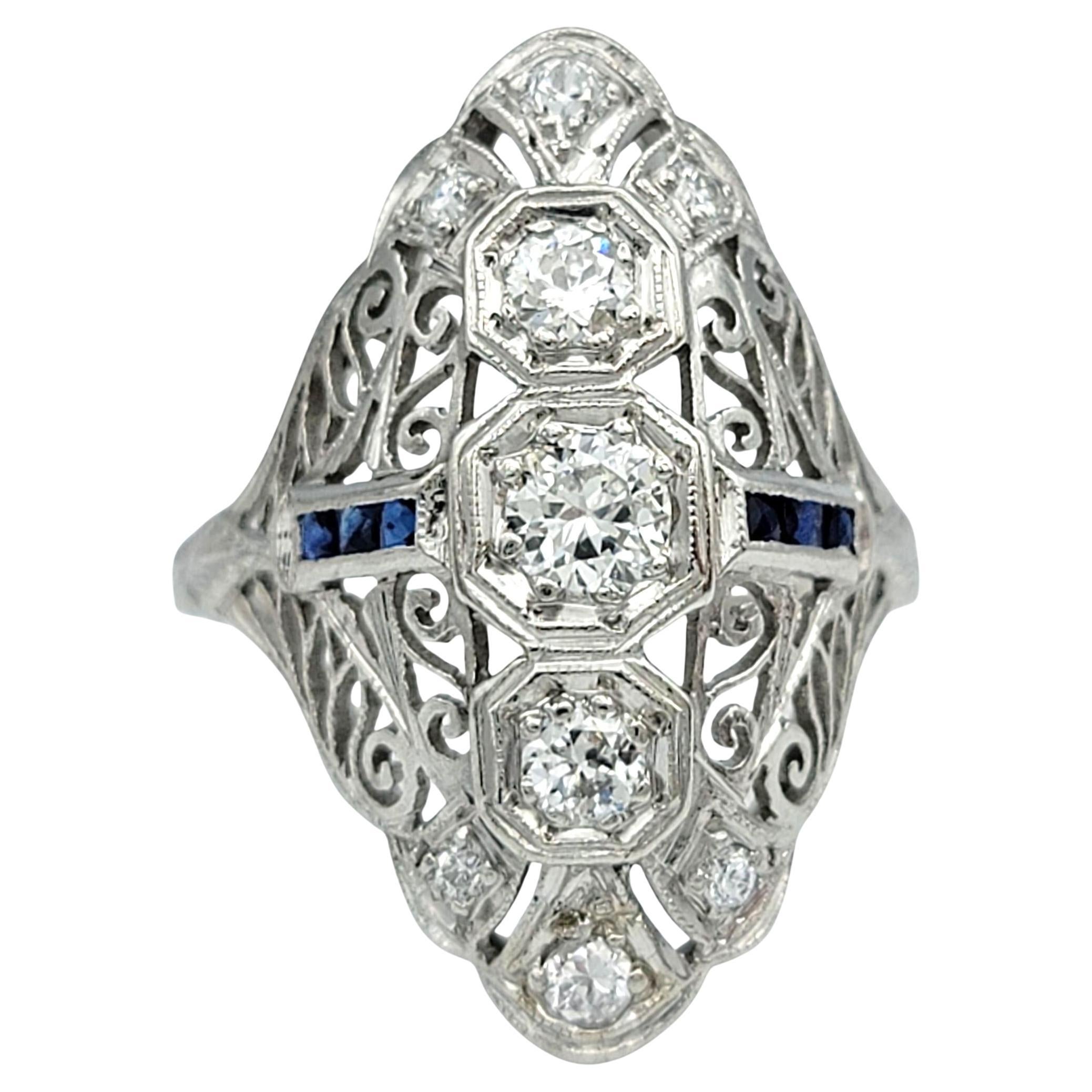 Bague de cocktail vintage en platine, diamant et saphir bleu de style Navette