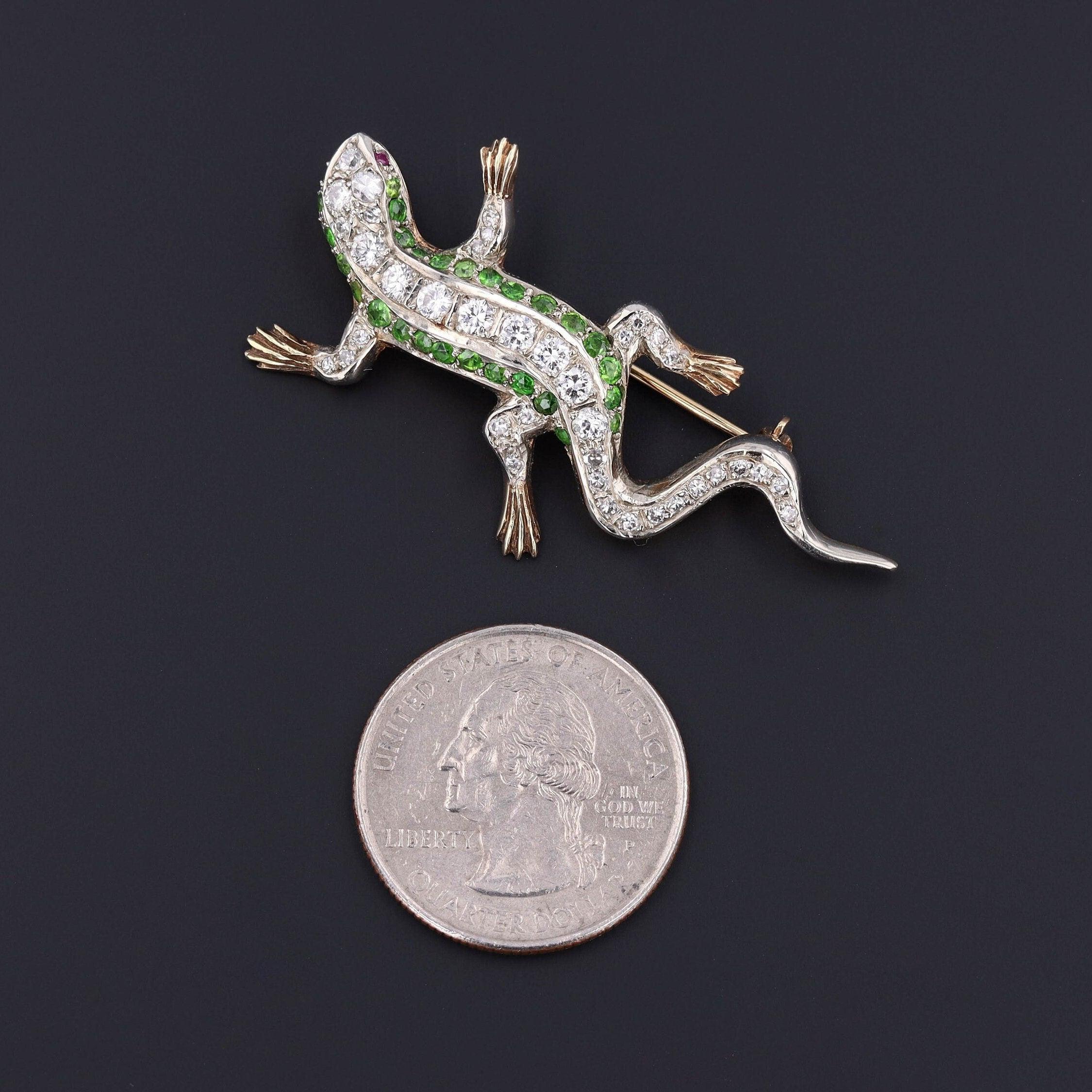 Lizards, animals with a heightened sensitivity to their surroundings, are a symbolic reminder of self awareness, particularly through dream interpretation. 

This vintage brooch (circa 1940-1950) features a lizard of 14k gold adorned in diamonds and
