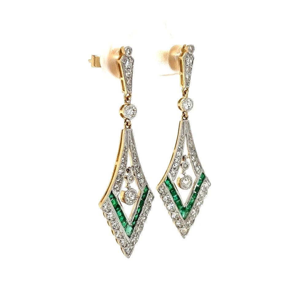 Simply Beautiful! Vintage Diamond and Emerald V Drop Milgrain Gold Earrings. Hand set with Diamonds, approx. 0.83tcw and Emeralds, approx. 0.43tcw. Approx. 1.50tcw. Measuring approx. 1.5” long. Post system. Beautifully Hand-crafted 14K Yellow Gold