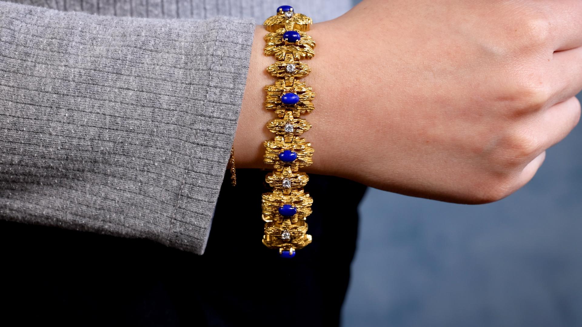 One Vintage Diamond and Lapis Lazuli 18k Yellow Gold Modernist Link Bracelet. Featuring 10 cabochon cut lapis lazuli with a total weight of approximately 5.00 carats. Accented by 10 round brilliant cut diamonds with a total weight of approximately