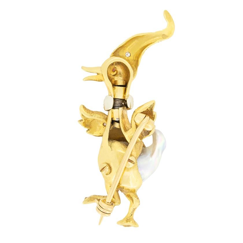 Crafted in the 1970s, this whimsical en tremblant brooch has been crafted in the likeness of a duck. Made entirely in 18 carat yellow gold, the duck features a pearl as it’s body along with diamonds set across a collar, with two further diamonds on