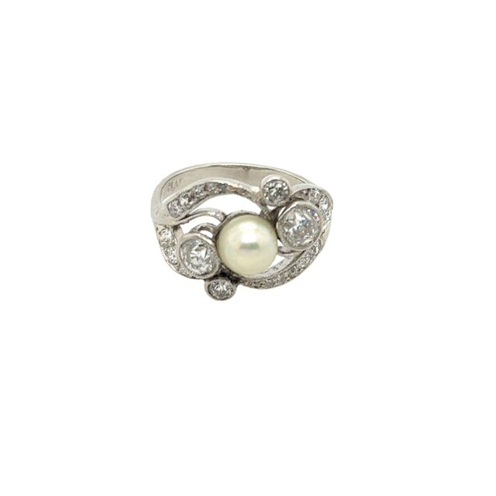 This vintage Diamond and Pearl ring features 21 beautiful Round Victorian cut Diamonds with a total diamond weight of 0.90ct and a 6mm pearl centre stone. The Platinum setting is both timeless and classic and completes the overall look of this