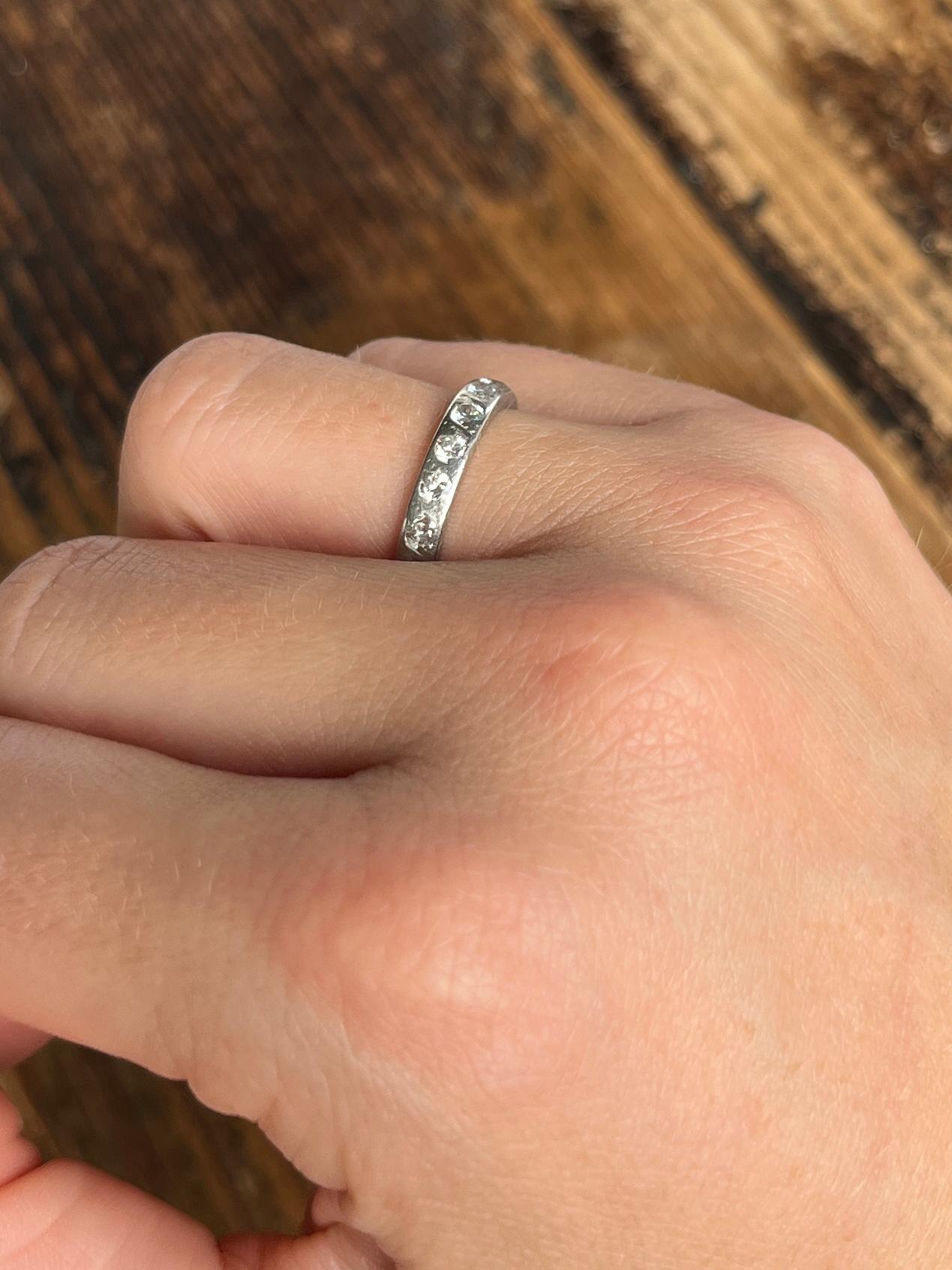 The most beautiful and sparkling eternity ring set with diamonds all the way around the platinum band. Dimond total is approx 70pts. 

Ring Size: J 1/2 or 5
Band width: 3mm

Weight: 2.77g