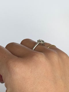 Vintage Diamond and Platinum Halo Solitaire Ring