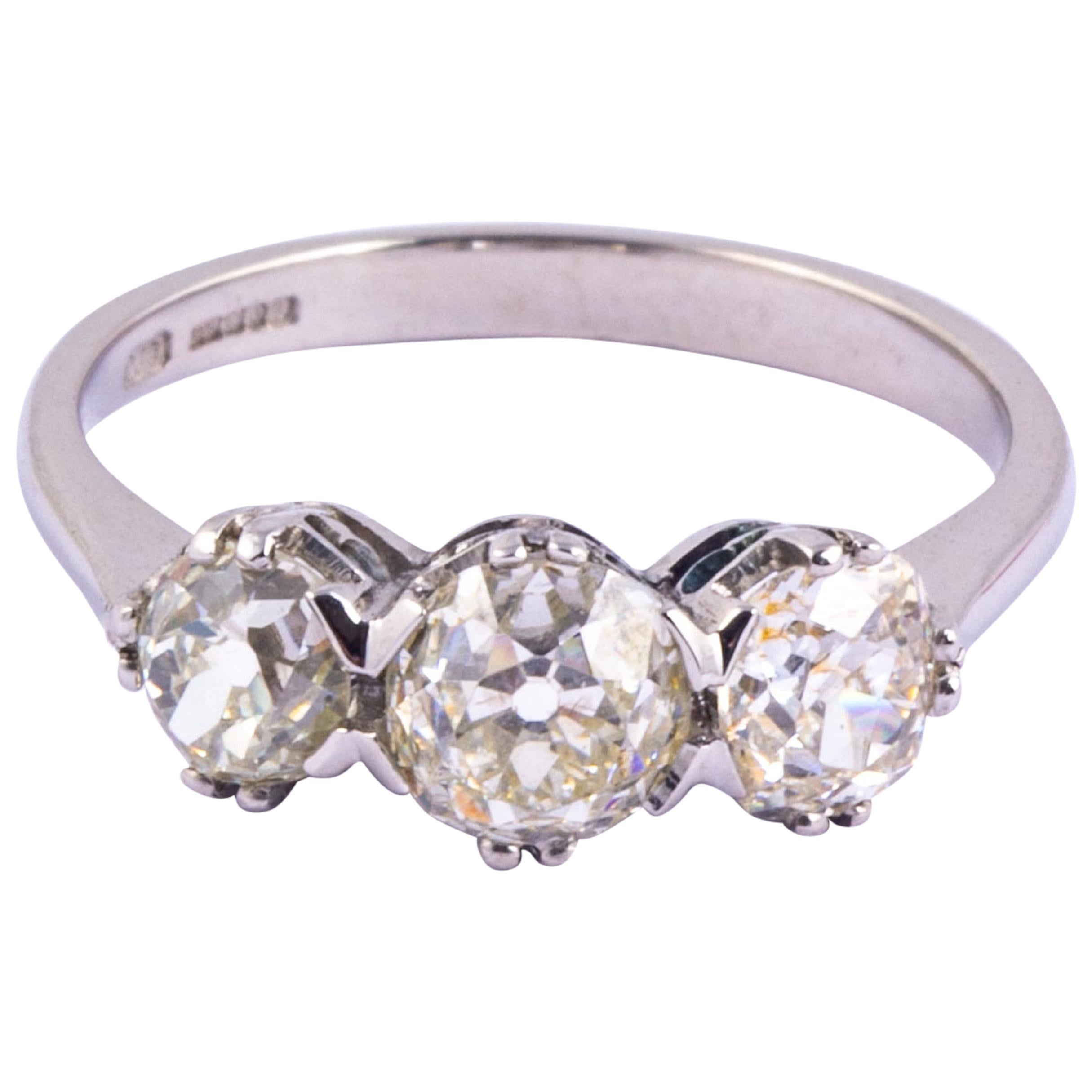 Vintage Diamond and Platinum Three-Stone Ring For Sale