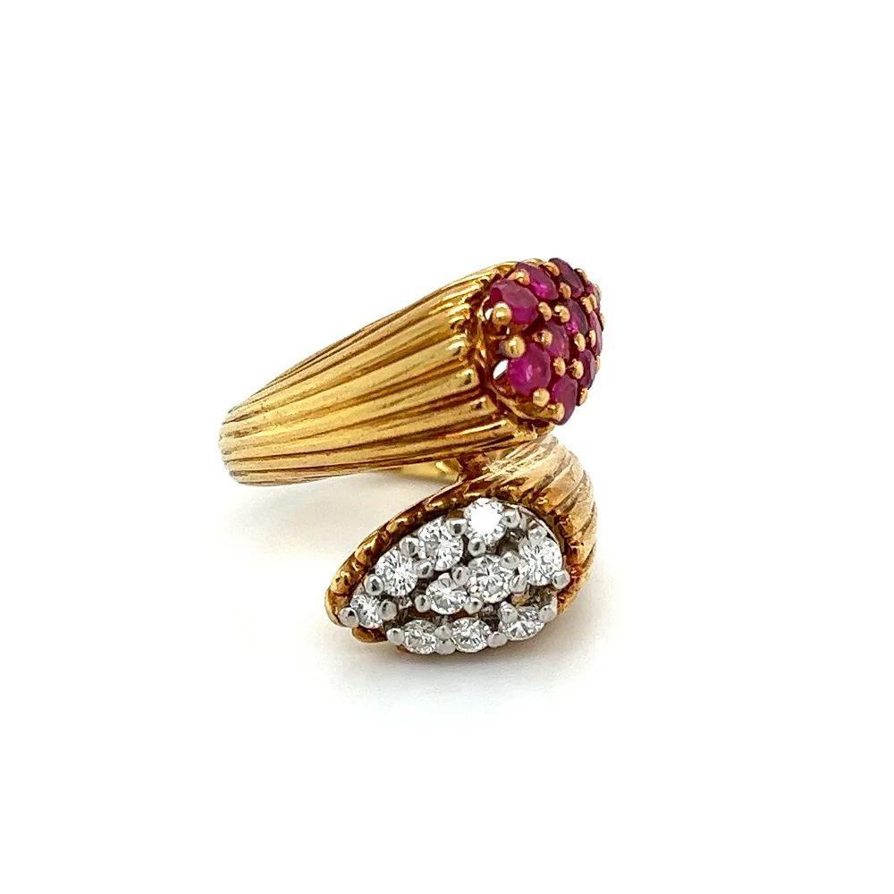 Simply Beautiful! Vintage Mid Century Modern Toi et Moi Ruby and Diamond Gold Retro Bypass Ring. Hand set with a Cluster of Rubies, weighing 0.90tcw and Diamonds, weighing approx. 0.40tcw. Hand crafted 18K Yellow Gold fluted design mounting. Ring