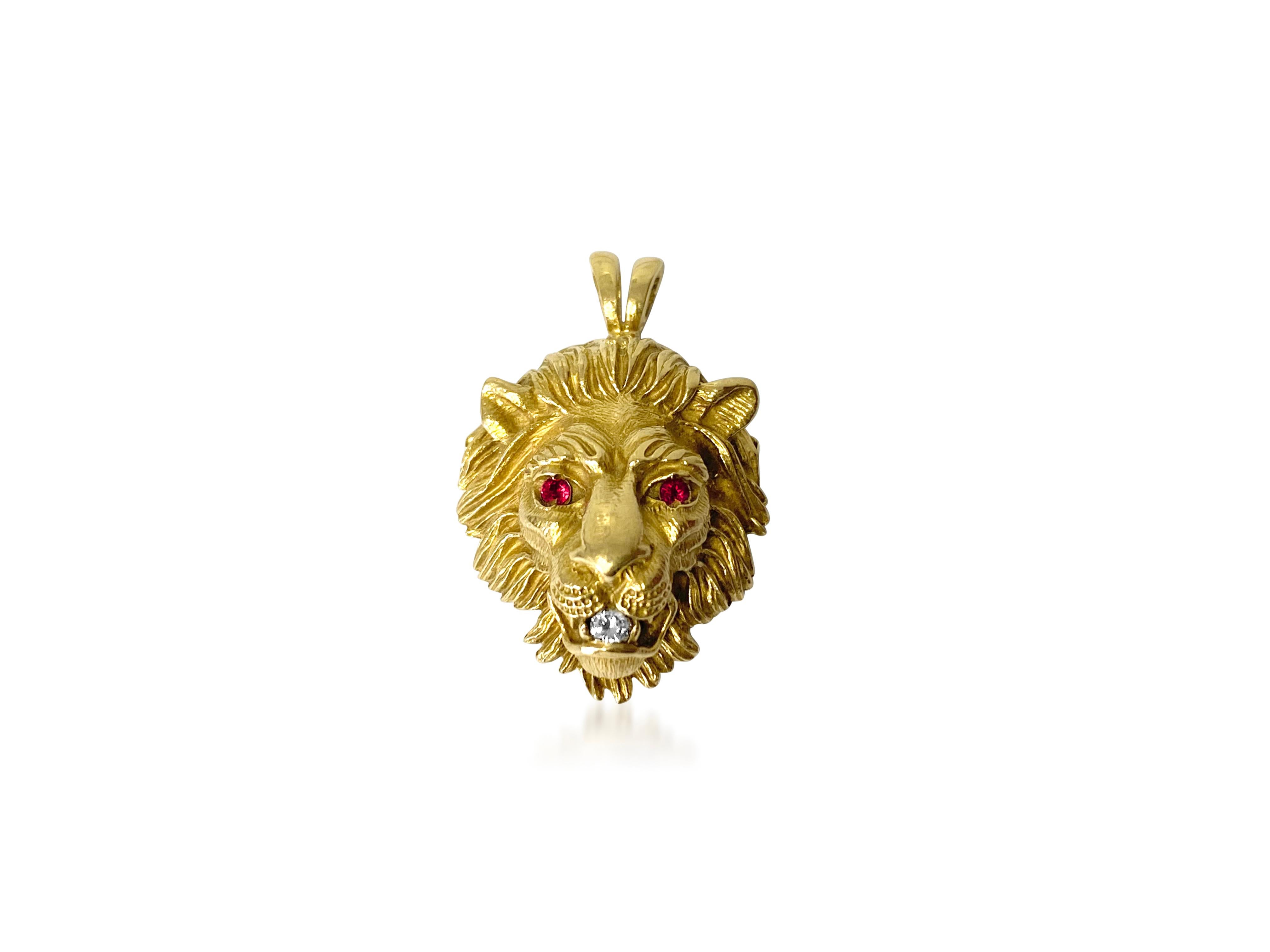 gold lion pendant with ruby eyes