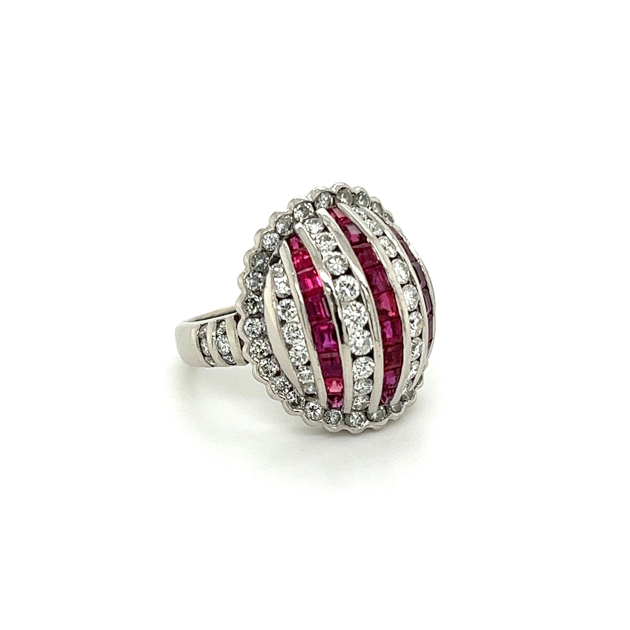 Simply Beautiful! Pave Diamond and Ruby Dome Band Ring. Securely Hand set with alternating rows and surround of Diamonds, weighing approx. 1.26tcw and Rubies. Approx. 1.47tcw. Hand crafted Platinum mounting. Measuring approx. 10.96” l x 0.79” w x