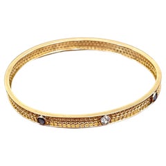 Vintage Diamond and Sapphire 10 Karat Yellow Gold Bangle Bracelet