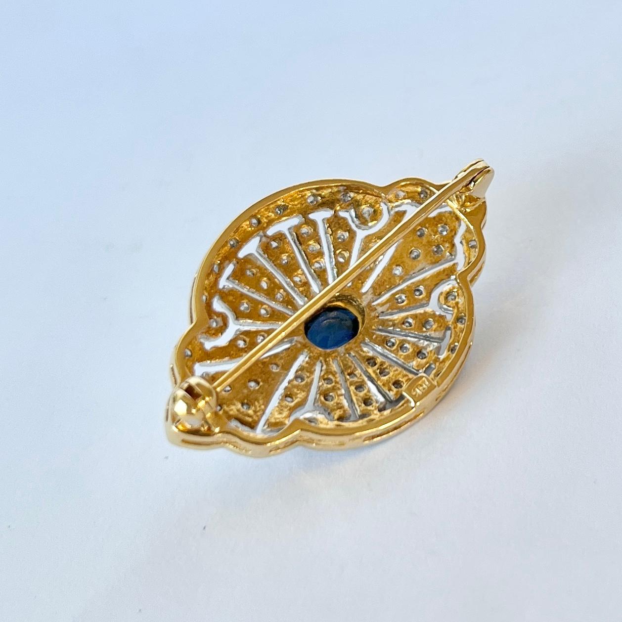 This stunning brooch is super stylish and has a lovely subtle sparkle with the diamonds set into it. The diamonds total approx 60pts. The sapphire measures 35pts. Modelled in 18carat gold. 

Brooch Dimensions: 30x21mm 

Weight: 6.5g