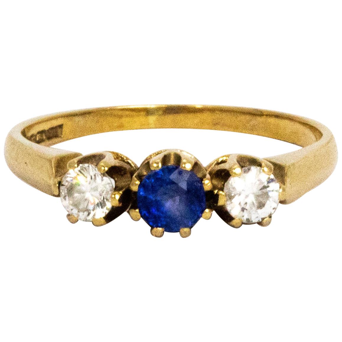 Anillo vintage de oro de 9 quilates con diamantes y zafiros