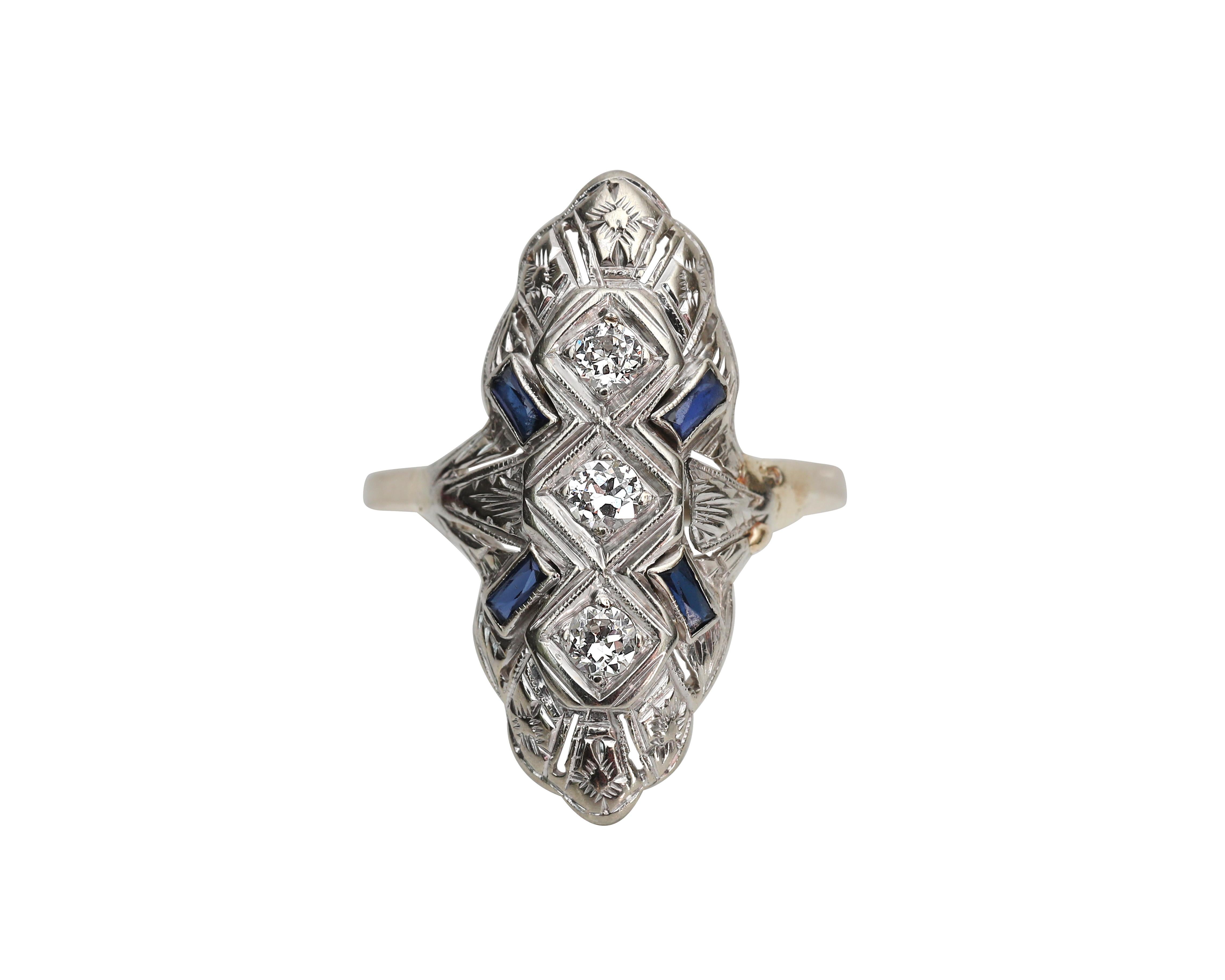 Description: 
Here we have a stunning Art Deco diamond and sapphire navette shaped 