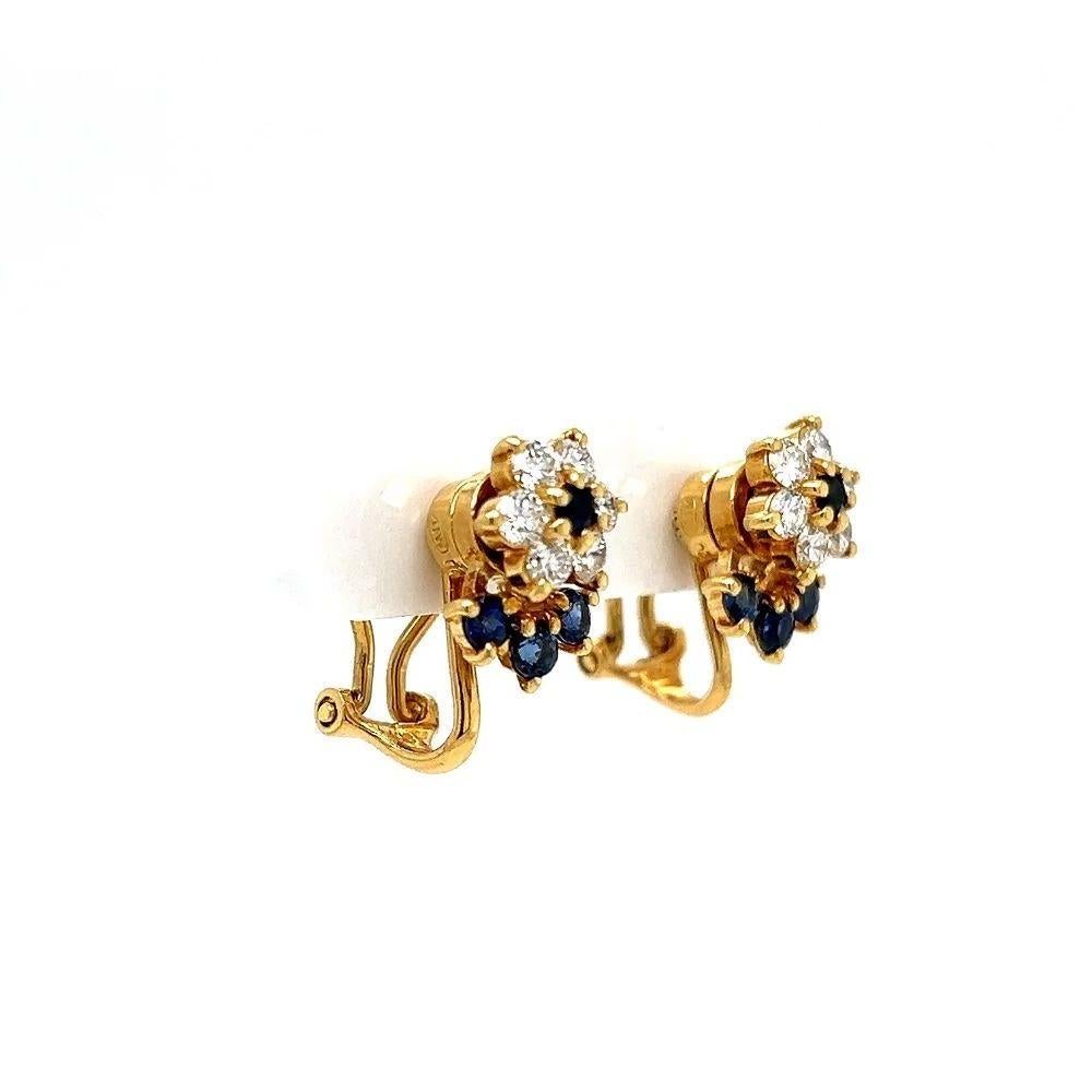 Einfach schön! Vintage Diamond and Sapphire Spinner Gold Fein detaillierte Ohrringe. Jeder Ohrring zentriert einen von Hand gefassten, strahlenden Diamanten im Rundschliff, mit einem Gewicht von ca.  0,65 Karat, umgeben von einem Diamant-Halo. Der