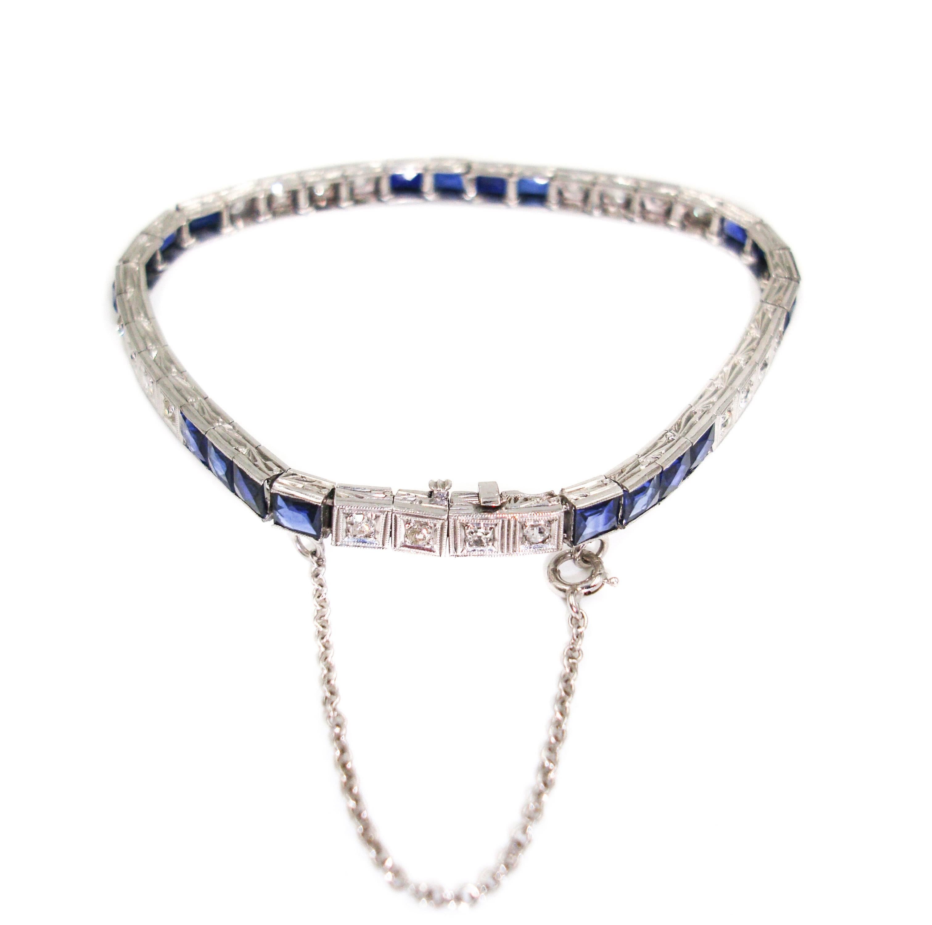 Gorgeous!!  Diamond and Sapphire Straight-Line Bracelet, featuring 7.00 carats of blue sapphires and 0.60 carats of diamond. Beautifully set in 14k white gold measuring a perfect length of 7