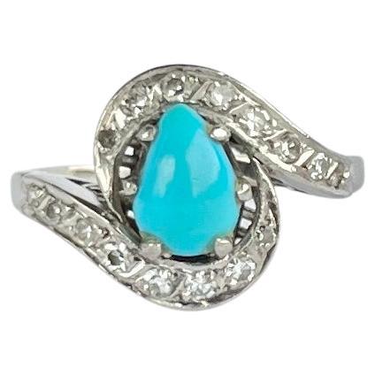 Bague vintage en platine avec diamants et turquoises 