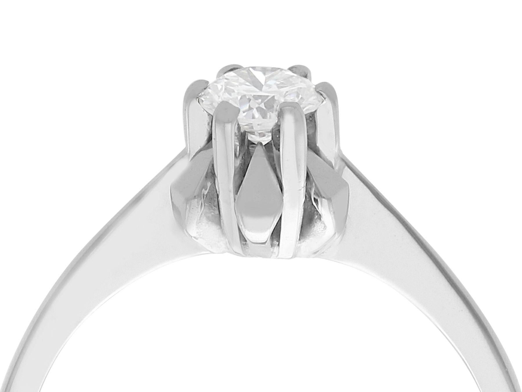 An impressive 0.35 carat diamond and 18 karat white gold solitaire style engagement ring; part of our diverse antique jewelry and estate jewelry collections.

This fine and impressive diamond solitaire ring has been crafted in 18k white gold.

The