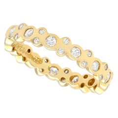 Anillo de compromiso vintage de diamantes y oro amarillo de eternidad completa
