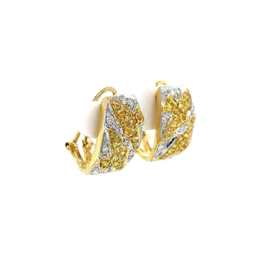 Simply Beautiful! These Vintage Sapphire and Diamond Gold Hoop Earrings feature Stylized DOVES Hand set with 40 Yellow Sapphires, approx. 1.50tcw and 28 White Brilliant Diamonds, approx. 0.70tcw. Post and Clip system. Hand crafted 2-tone 18K Gold