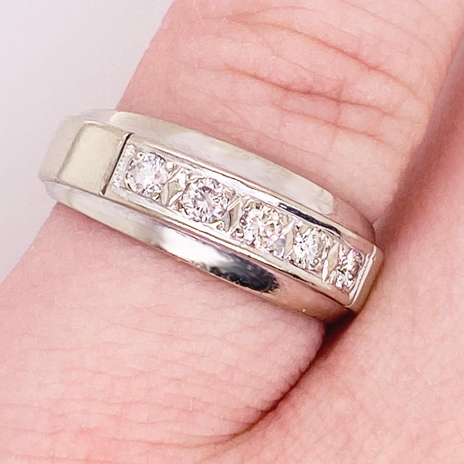 This gorgeous, sleek, vintage diamond band has five natural diamonds going around the top of the band crafted in 14 karat gold. This would make such a gorgeous wedding band or anniversary band! The ring is CIRCA 1950 and was constructed well with