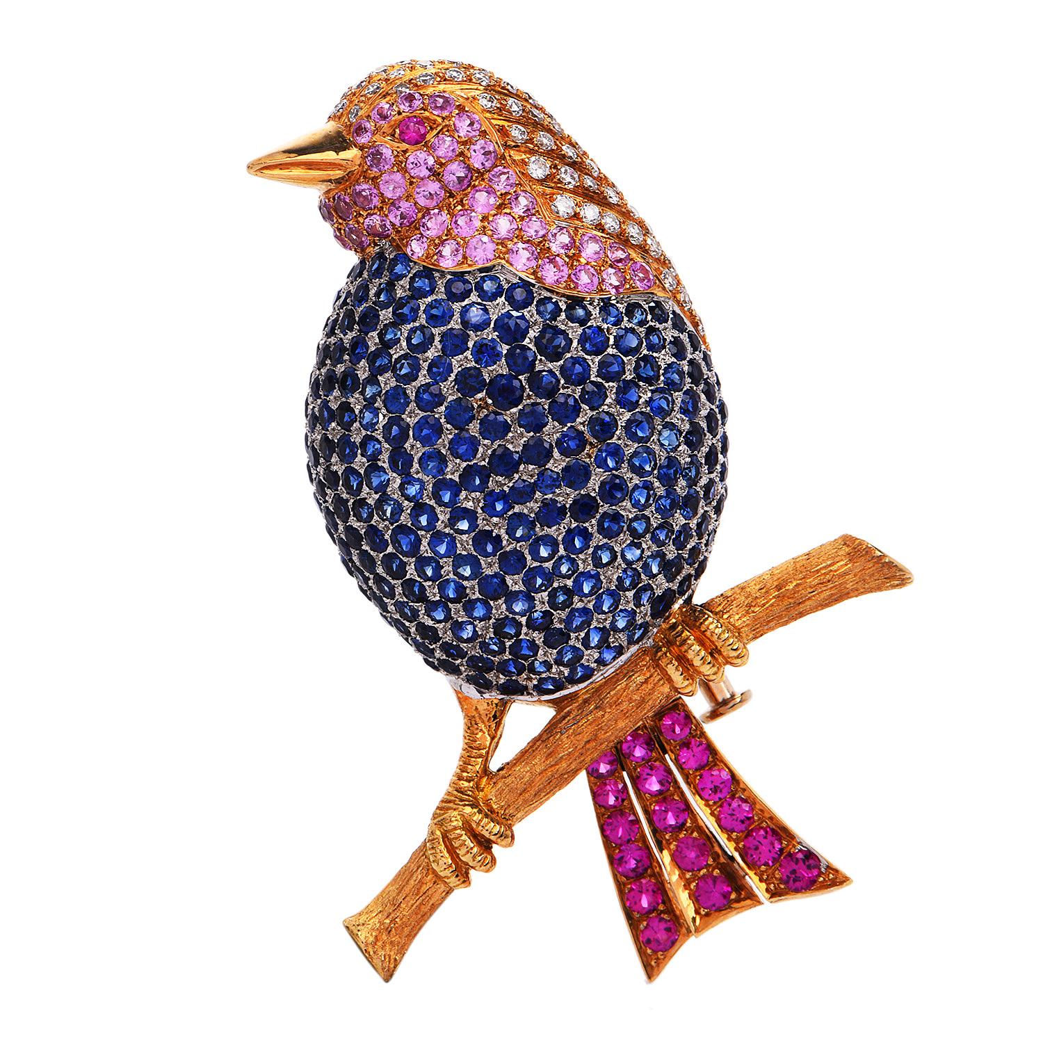 This stunning Vintage songbird pin is crafted in solid 18K yellow and white gold.

Its crest is elaborated with 53 genuine pave set round fancy natural diamonds approx. 0.50 carats, and G-H color, VS clarity. 

The body of the bird is finely crafted