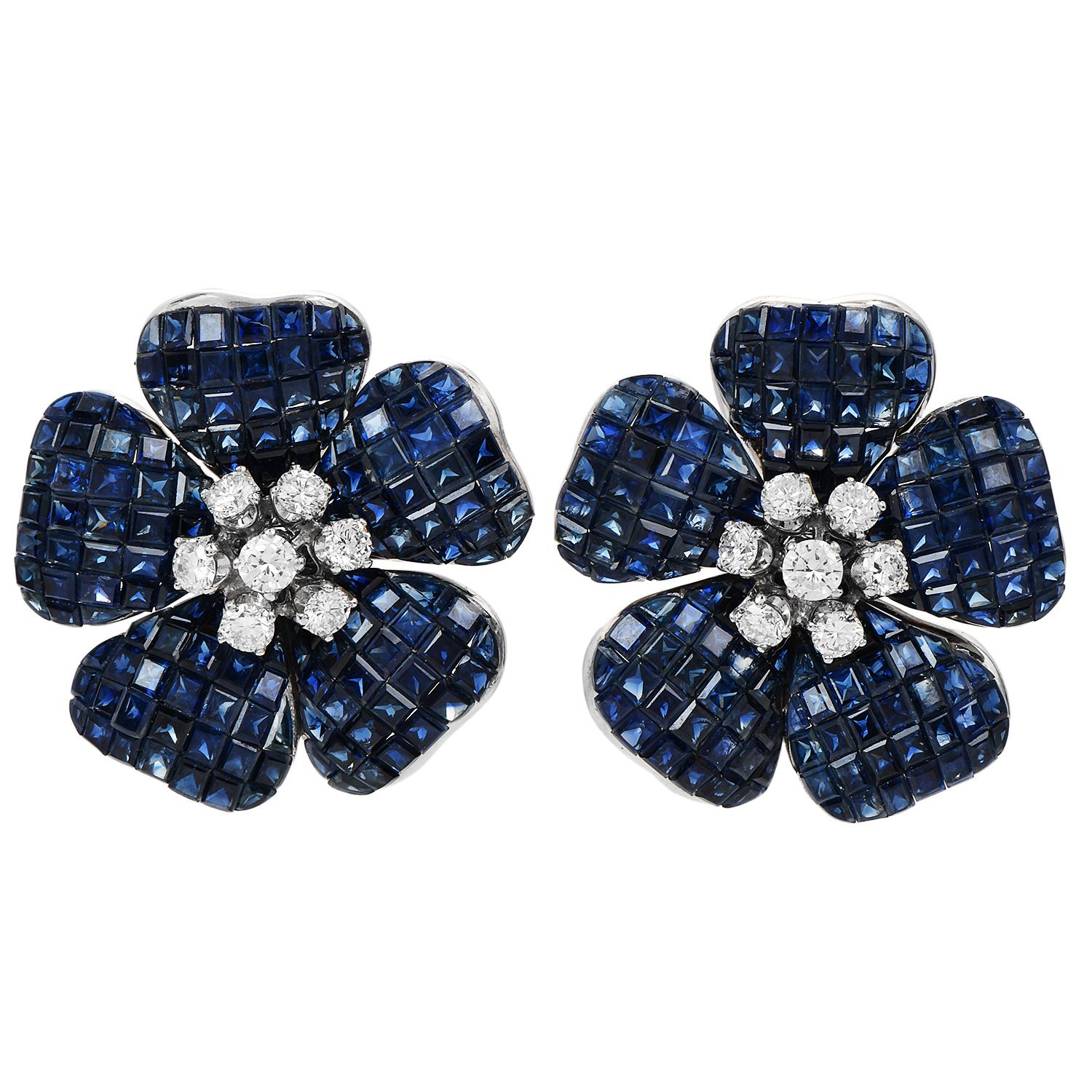 The Vintage Diamond Blue Sapphire 18K White Gold Flower Clip-On Earrings are a stunning pair of earrings that exude elegance and sophistication.

Crafted in 18K white gold, these earrings boast a timeless appeal and a lustrous shine.

The focal