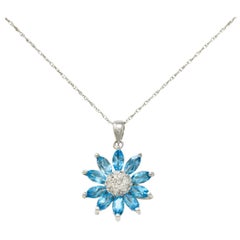 Vintage Diamond Blue Topaz 14 Karat White Gold Floral Radiating Pendant Necklace