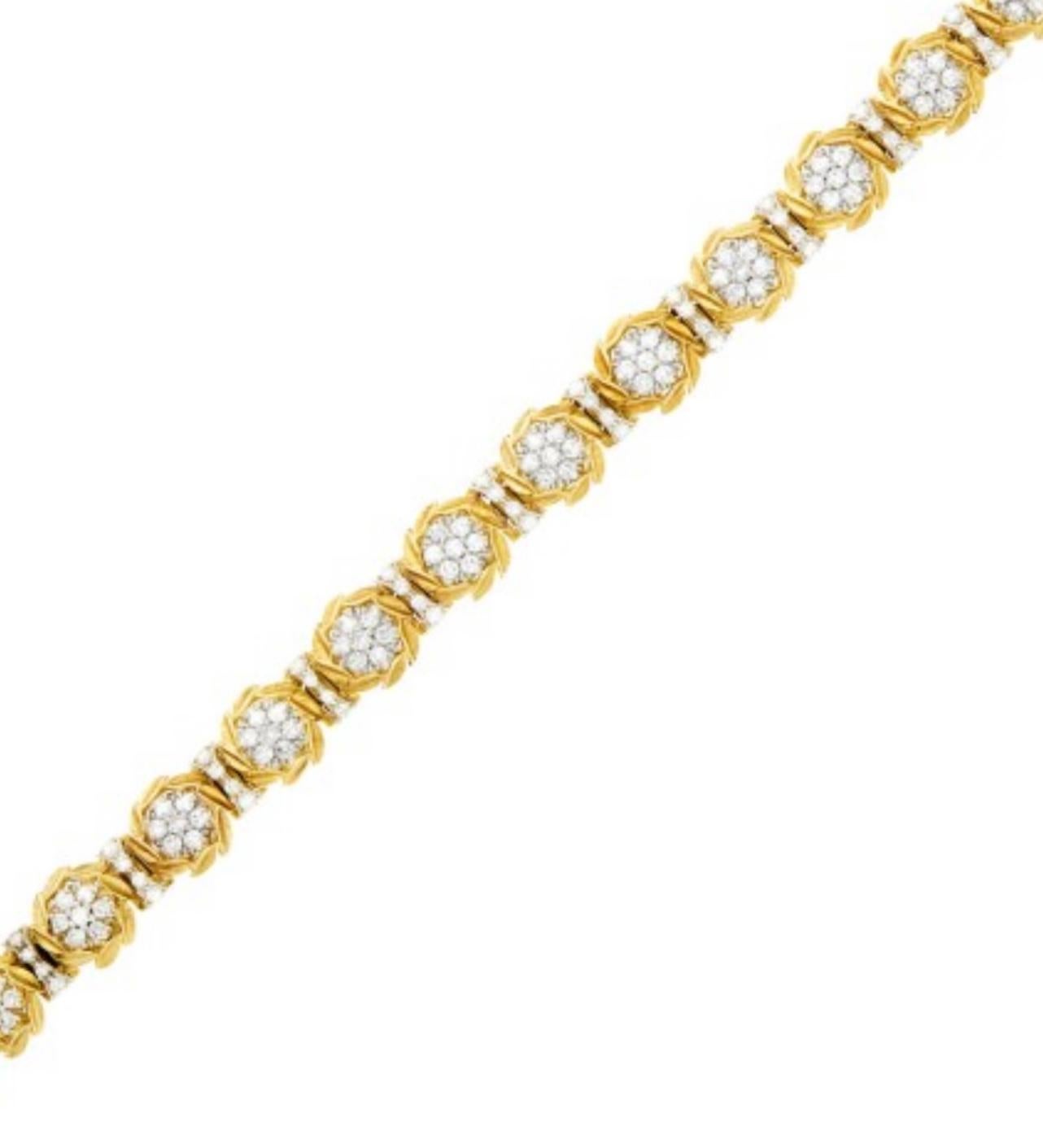 Vintage Two color gold and diamond bracelet beautifully handmade in 18 Karat Gold ( solid ) signed by Jabel. 
The details are as follows : 
Diamond weight : 4.50 carat approx ( H color and VS clarity ) / 165 single cut diamonds 
Measurements : 7 1/2