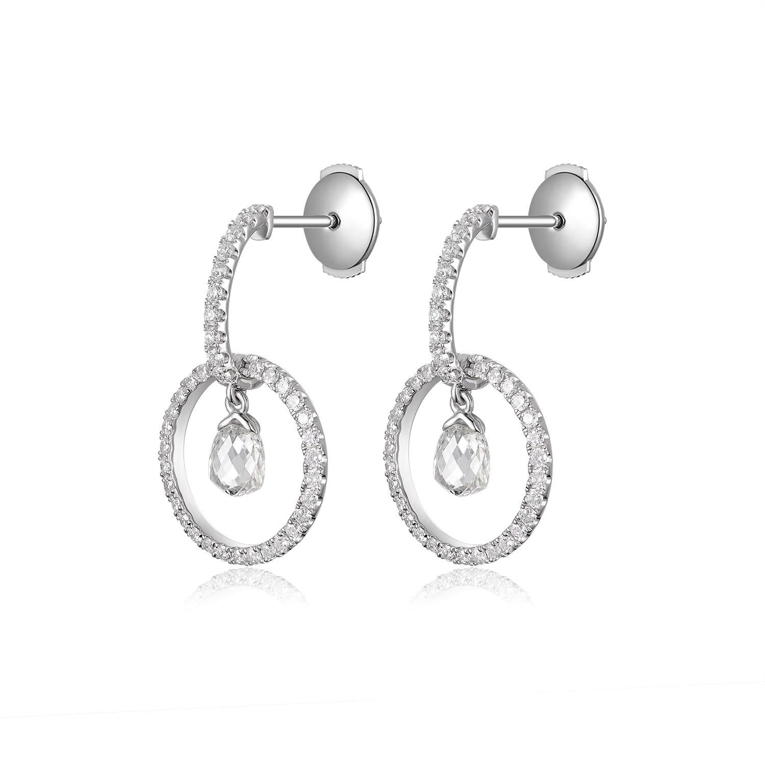Illuminate your presence with these exquisite Vintage Diamond Briolette Dangle Earrings, a timeless piece reflecting elegance and sophistication. The luxurious drop design of these earrings makes them a captivating addition to any jewelry