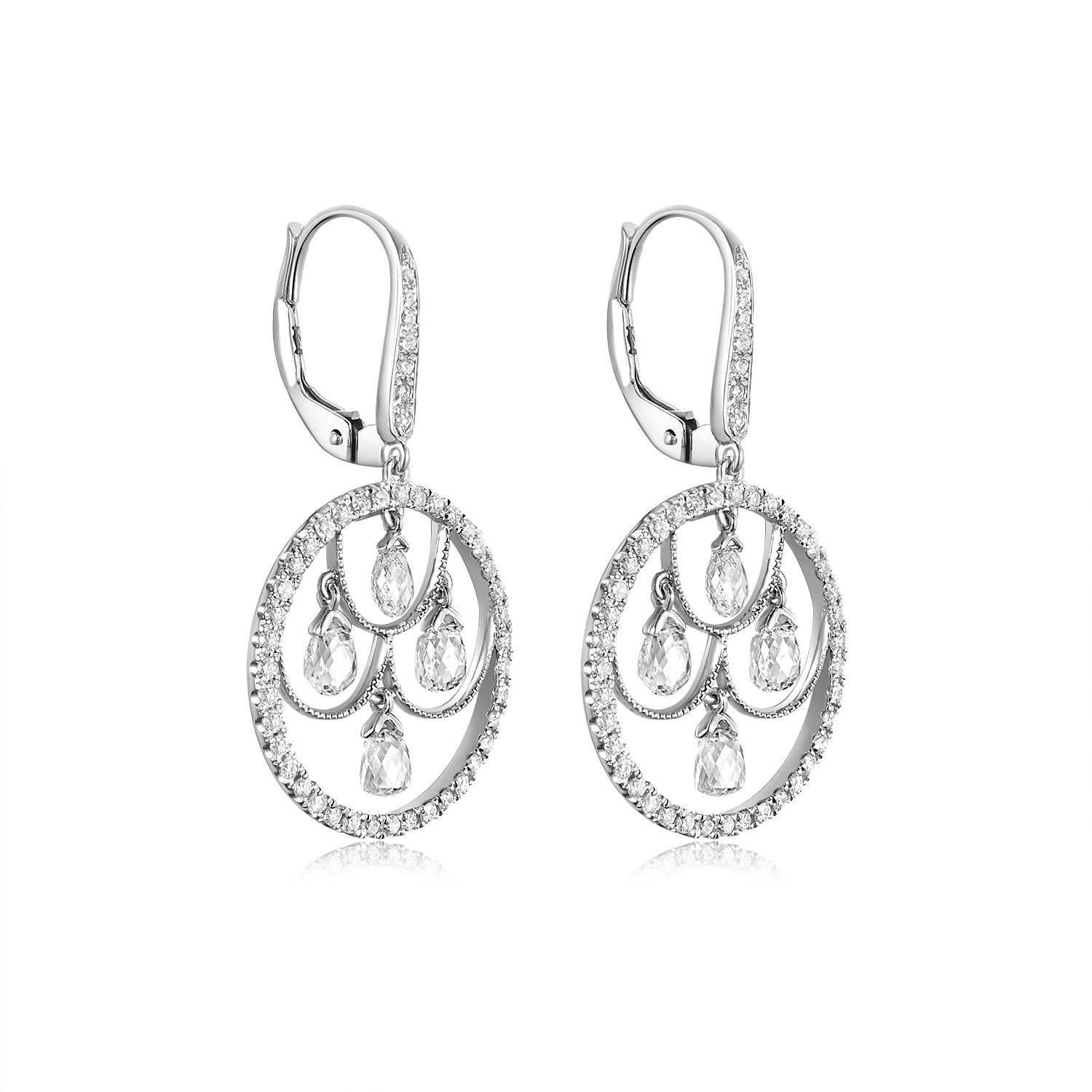 Experience timeless elegance with these enchanting dangle earrings, meticulously crafted in luminous 18 karat white gold. Central to their allure are 8 cascading briolette diamonds, weighing a total of 1.80 carats. Each earring showcases 4 of these