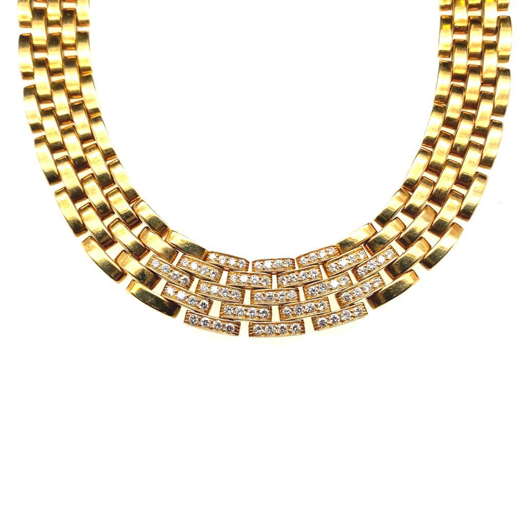 Ein Vintage-Diamant Cartier Panthère Ziegel Link 18 Karat Gelbgold Kragen Halskette.

Die Halskette besteht aus einem fünfreihigen Cartier-Klassiker mit flachen, massiven Gliedern im Ziegelstein-Stil aus 18 Karat Gelbgold, die in der Mitte mit