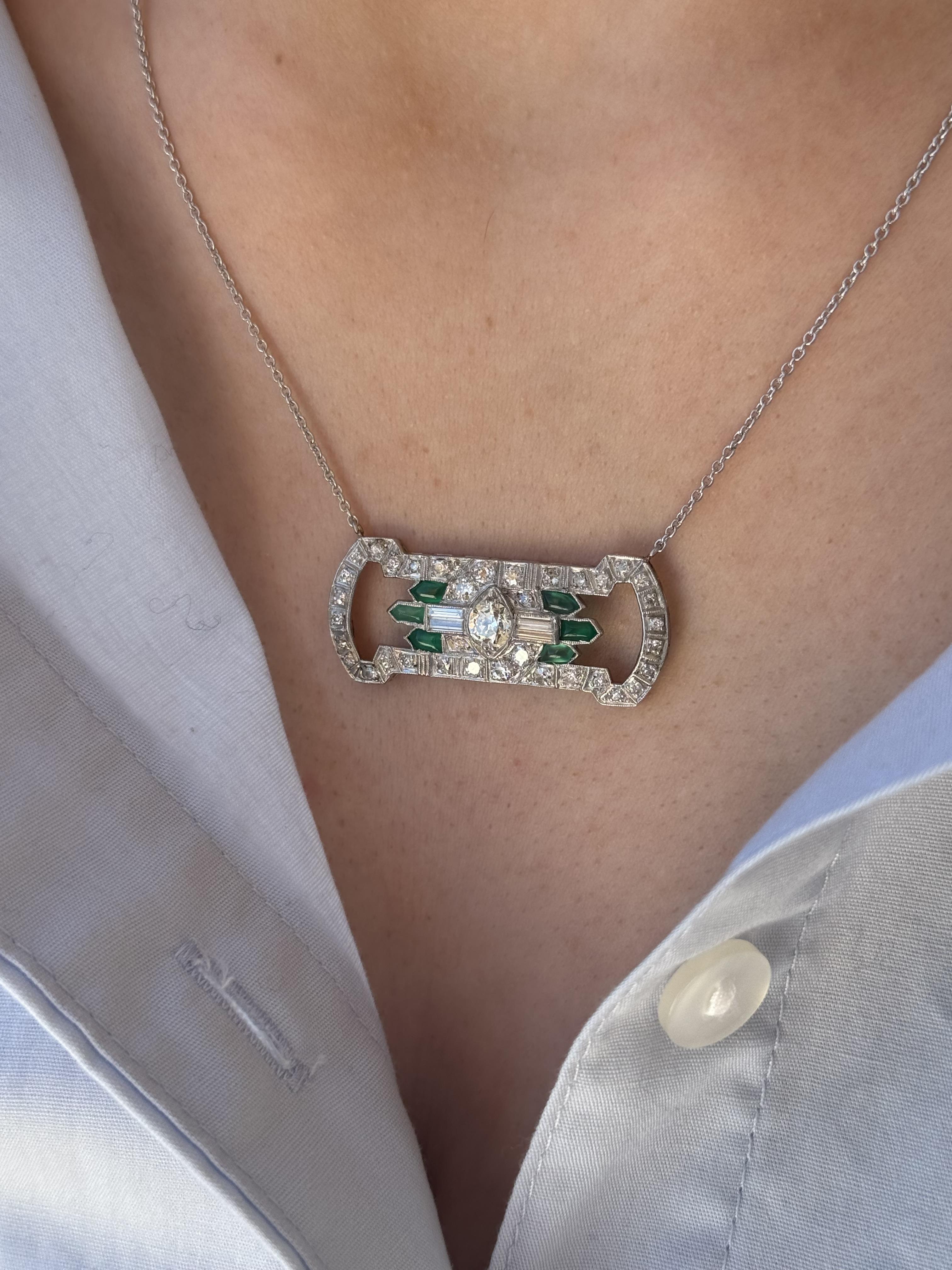 We are loving this unique vintage necklace!!
Converted from a lovely Art Deco Brooch into a piece to wear everyday.

Necklace Details
Material: Platinum Brooch & 14K White Gold Chain
Era: Art Deco 1920 - 1940
Pendant Length: 1 1/4 Inch
Pendant