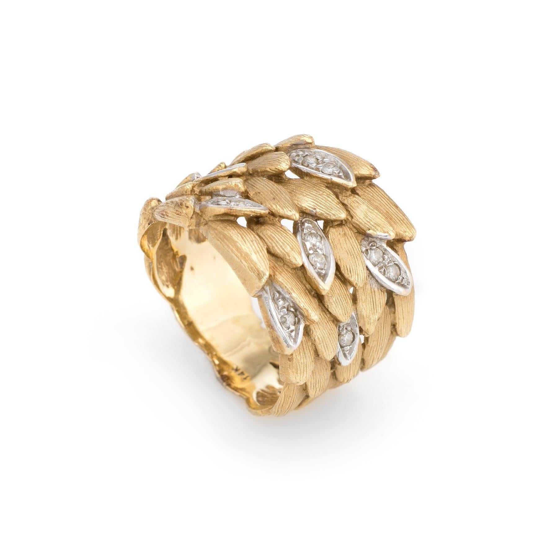 Elegant & finely detailed vintage diamond leaf band (circa 1960s to 1970s), crafted in 14 karat yellow gold. 

12 single cut diamonds are estimated at 0.01 carats each (0.12 carats total estimated weight). The diamonds are estimated at I-J color and