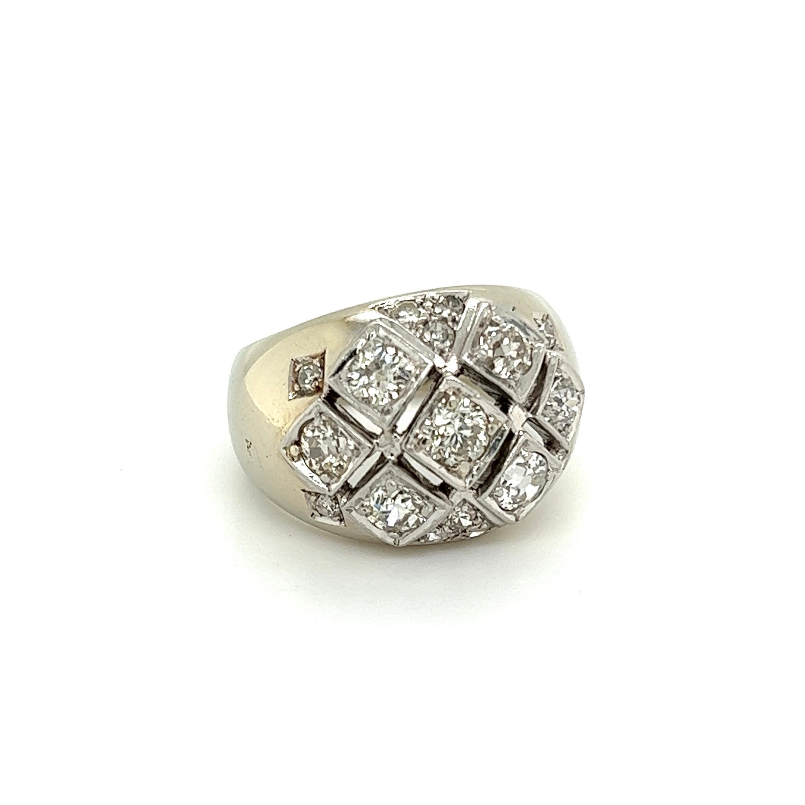 Simply Beautiful! Striking and Finely detailed Diamond Gold 14mm Dome Cluster Ring. Hand set with Scattered Old Cut Diamonds, weighing approx. 1.40tcw. Measuring approx. 0.90” l x 0.79” w x 0.55” h. Hand crafted in 14 Karat White Gold. Ring size