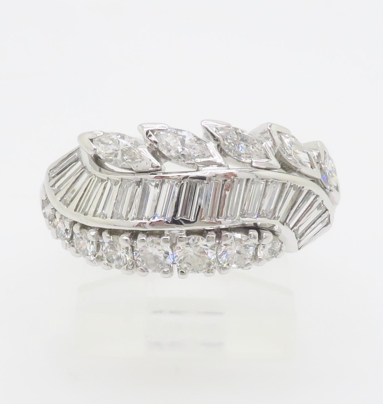 Vintage Diamond Cocktail Ring featuring Round, Baguette, and Marquise Diamonds For Sale 6