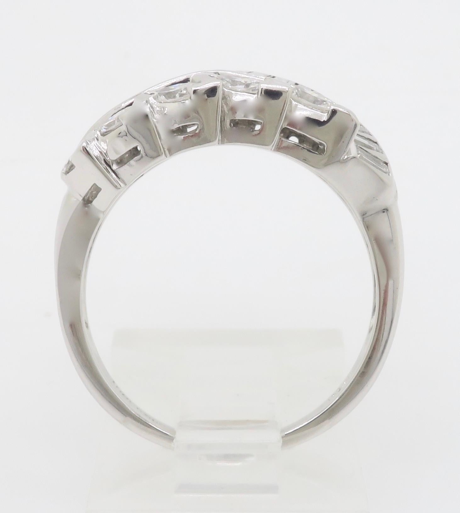 Vintage Diamond Cocktail Ring featuring Round, Baguette, and Marquise Diamonds For Sale 9