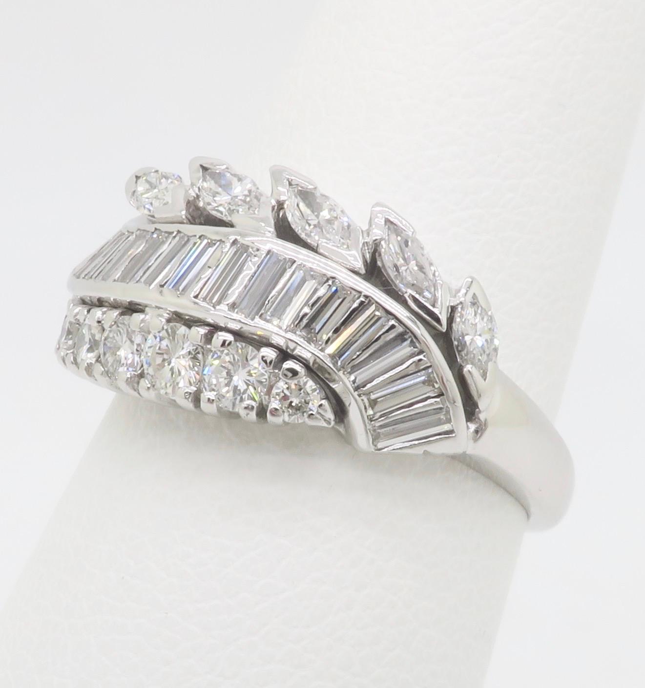 Vintage Diamond Cocktail Ring featuring Round, Baguette, and Marquise Diamonds For Sale 1