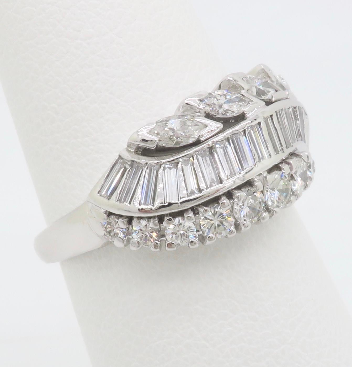 Vintage Diamond Cocktail Ring featuring Round, Baguette, and Marquise Diamonds For Sale 2