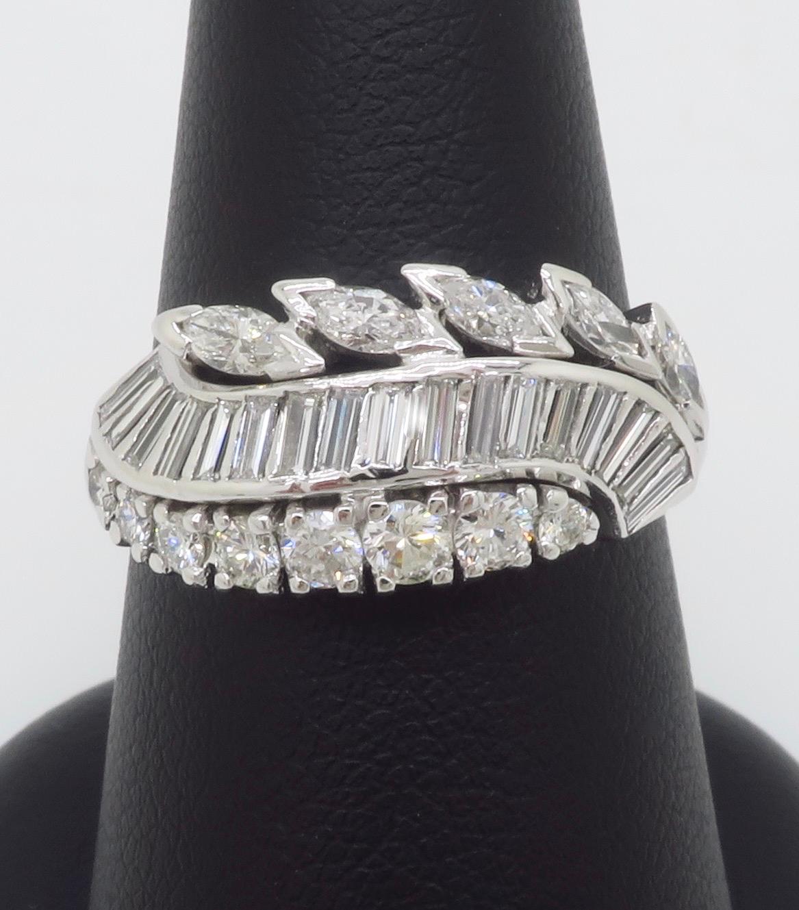 Vintage Diamond Cocktail Ring featuring Round, Baguette, and Marquise Diamonds For Sale 3