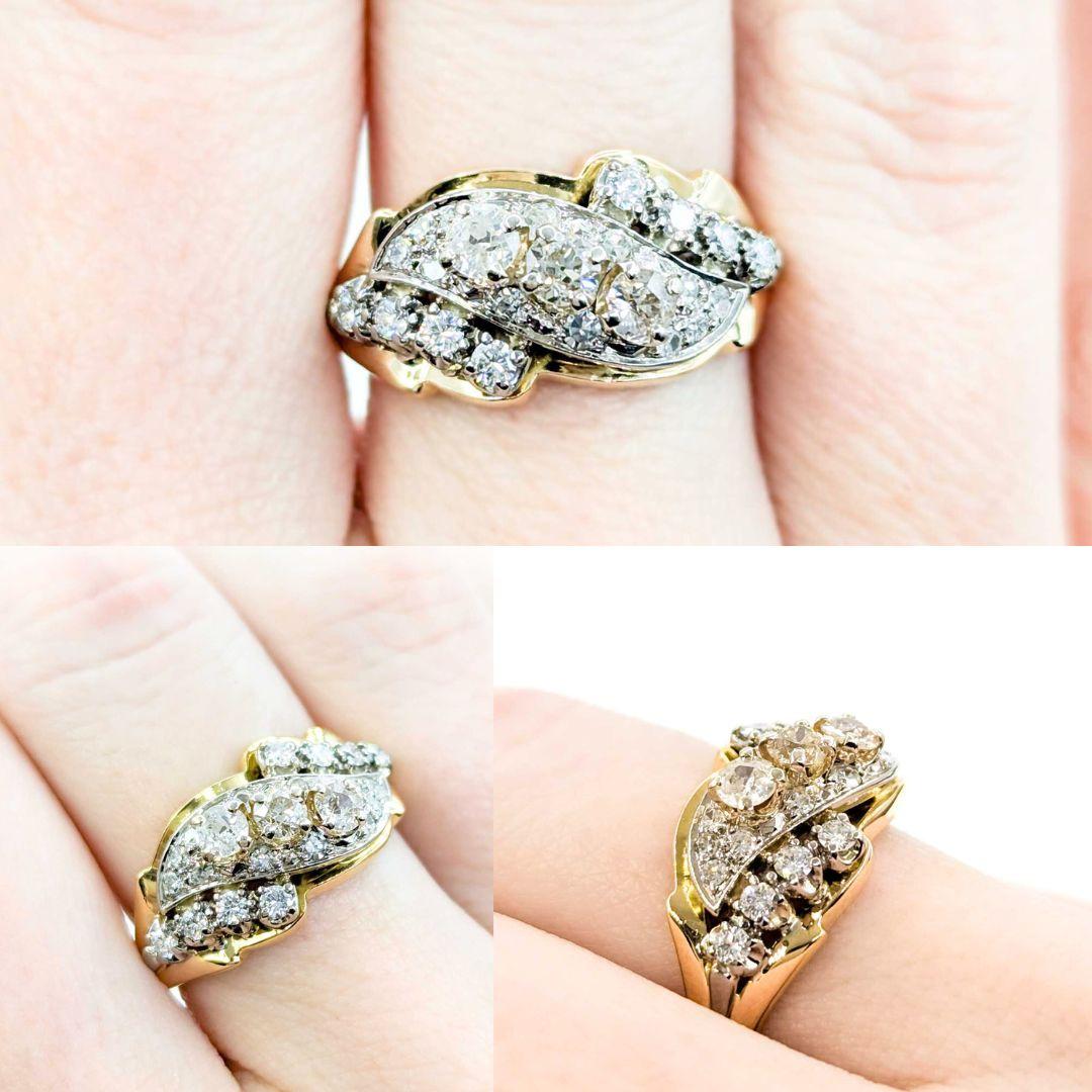 Vintage Diamond Cocktail Ring in 18K Yellow Gold

Introducing this beautiful vintage Diamond Cocktail Ring crafted in 18k yellow gold. The ring features .72ctw diamonds with I-SI clarity and a near-colorless white hue. This ring features a sleek