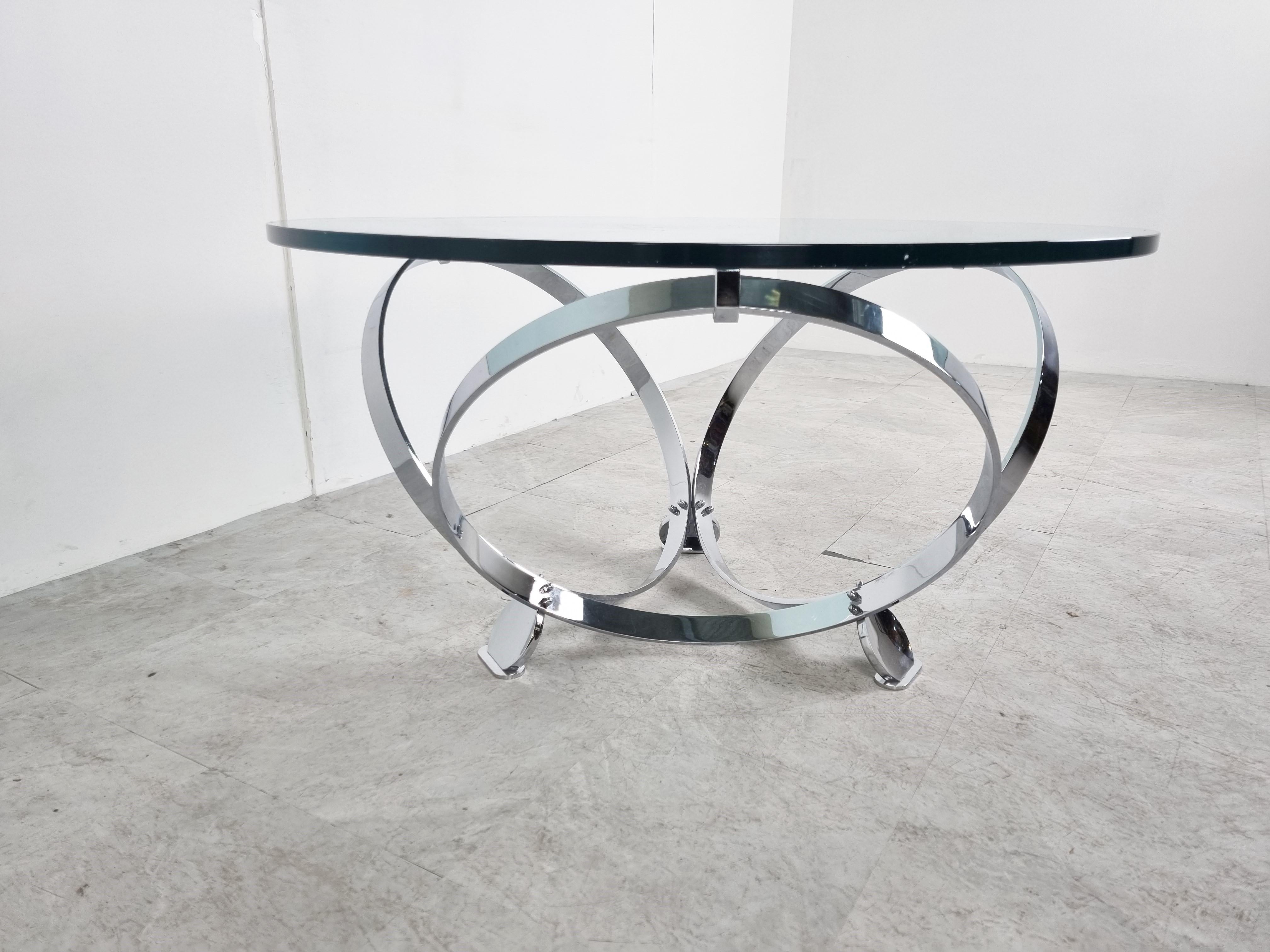 Midcentury 'diamond' coffee table by Knut Hesterberg for Ronald Schmitt.

The table has a clear round glass top with a sculptural aluminium base.

Timeless design.

Good condition.

1960s, Germany

Measures: Height 51cm/20.07