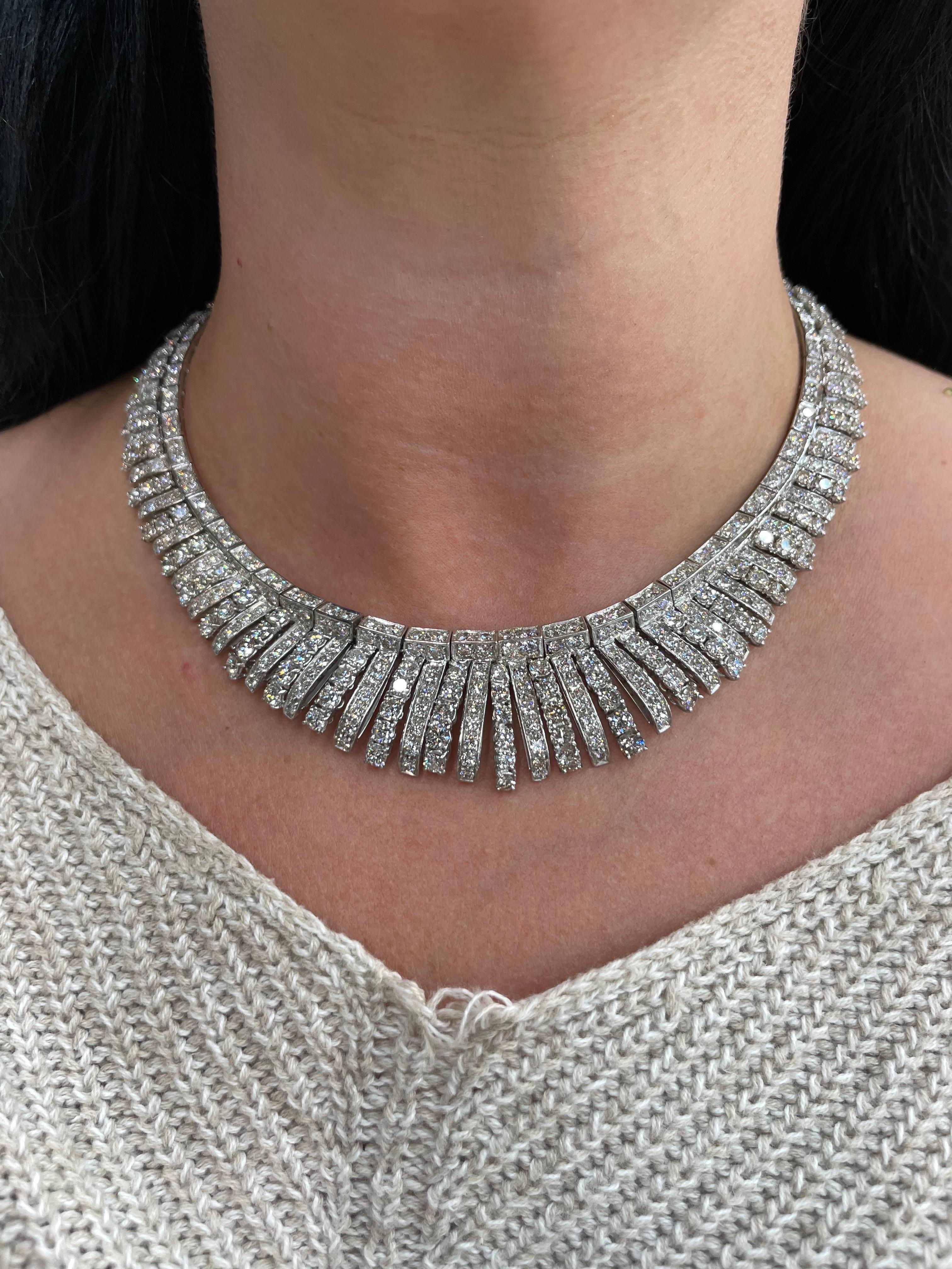 Vintage 18 karat white gold bib collar necklace featuring numerous round brilliants weighing approximately 66 carats, 113.5 grams. Very comfortable on the necklace! 
A real showstopper!