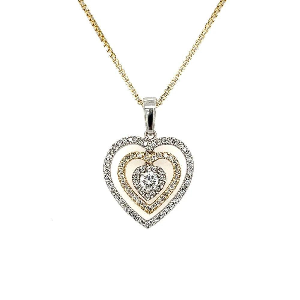 Vintage Diamond Double Heart Two-Tone Gold Pendant Necklace In Excellent Condition For Sale In Montreal, QC