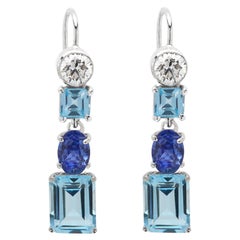 Boucles d'oreilles vintage en or blanc 14 carats avec diamant et aigue-marine naturelle.
