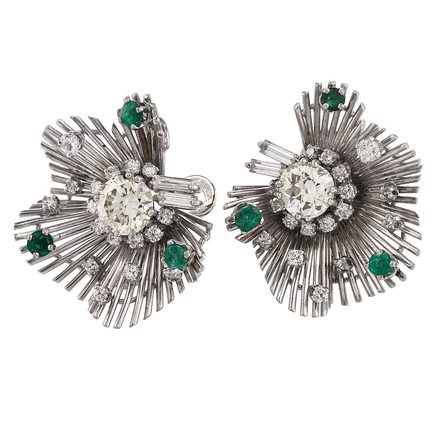 These beautiful clip-on earrings offer bright green Emeralds to contrast with the radiance of the Diamonds and weigh approximately 24.1 Grams.
Expertly Crafted in Solid Platinum, the center stones are (2) Old European cut Genuine Diamonds weighing
