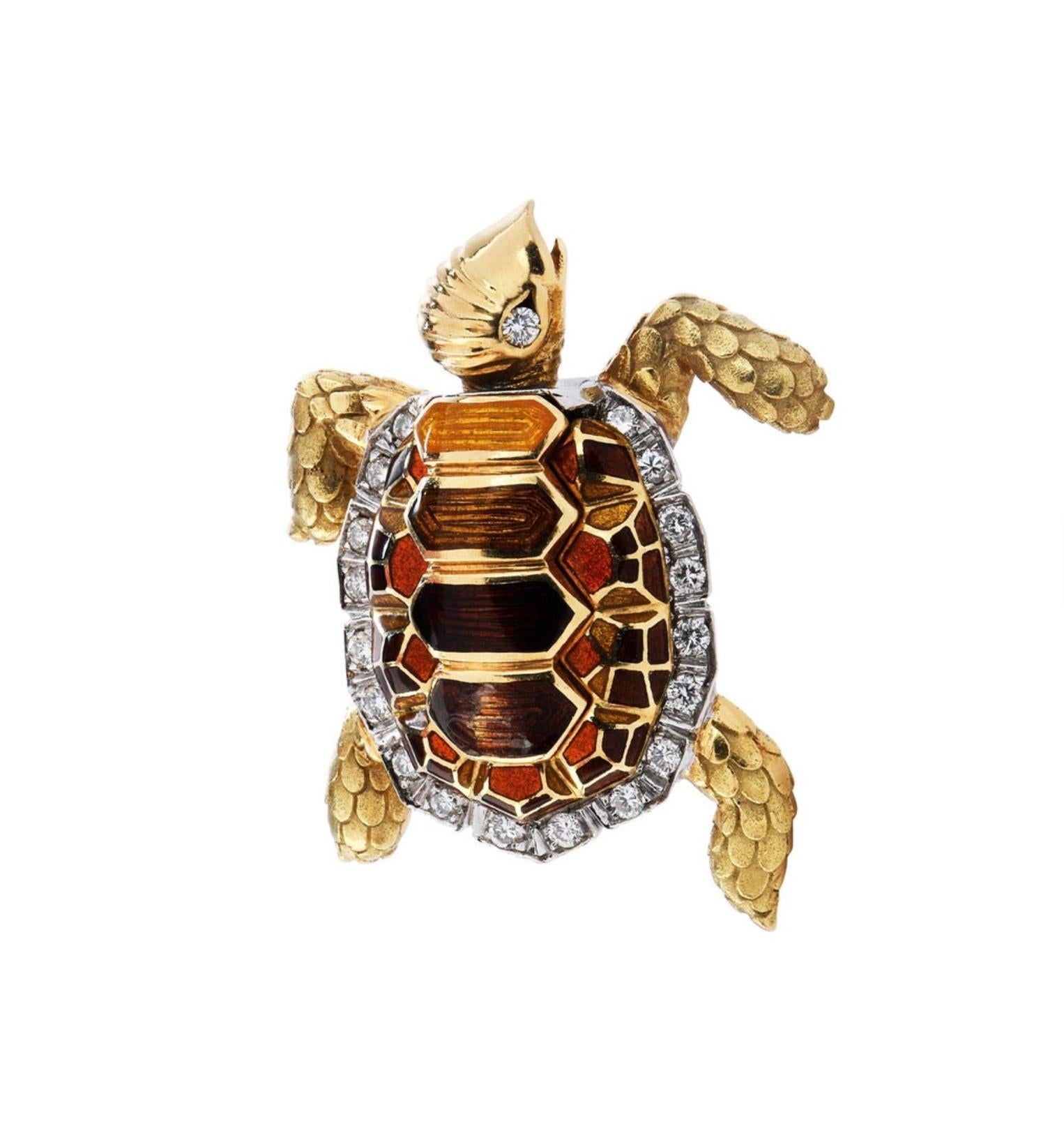  Beautifully crafted in solid 18K Yellow Gold, this Turtle Gem Brooch is finely encrusted with brilliant Natural Diamonds approx. 0.86 carats, G-h color, VS clarity. 

The turtle shell is adorned with color full of enamel from yellow to orange and