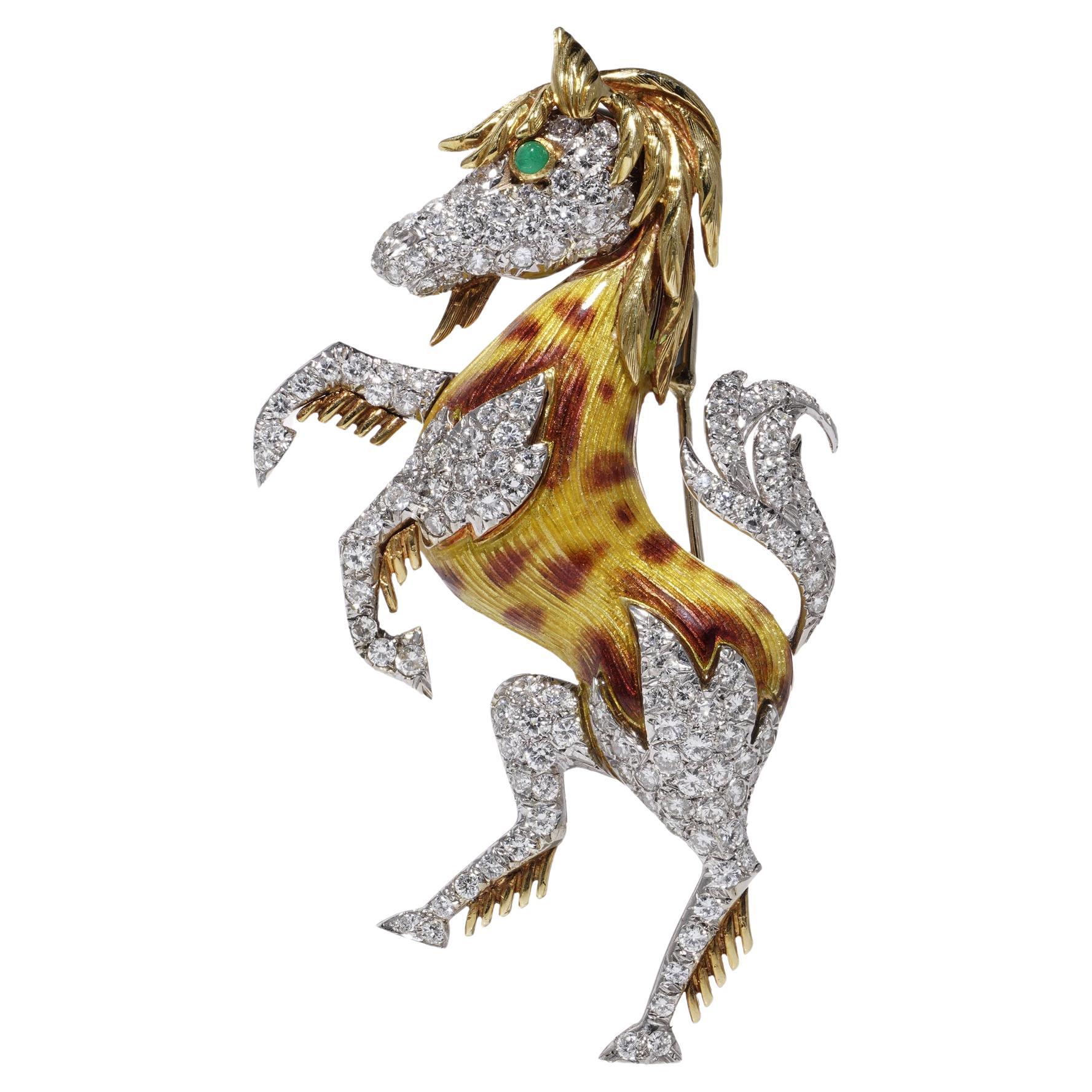 Vintage diamond, enamel, and emerald prancing horse brooch